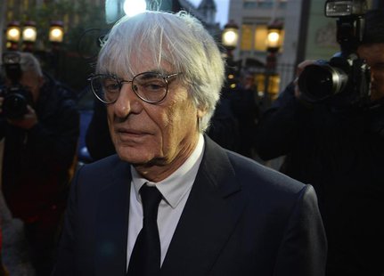 Formula One Chief Executive Bernie Ecclestone leaves the High Court in central London November 6, 2013. REUTERS/Toby Melville Formula One Chief Executive Bernie Ecclestone leaves the High Court in central London November 6, 2013. REUTERS/Toby Melville