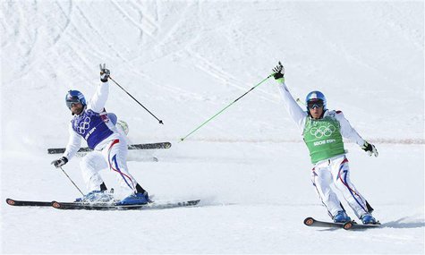 France's Arnaud Bovolenta (L) and France's Jean Frederic Chapuis cross the finish line during the men's freestyle skiing skicross final at t France's Arnaud Bovolenta (L) and France's Jean Frederic Chapuis cross the finish line during the men's freestyle skiing skicross final at t