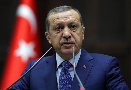 Turkey's Prime Minister Tayyip Erdogan addresses members of parliament from his ruling AK Party (AKP) during a meeting at the Turkish parlia Turkey's Prime Minister Tayyip Erdogan addresses members of parliament from his ruling AK Party (AKP) during a meeting at the Turkish parlia