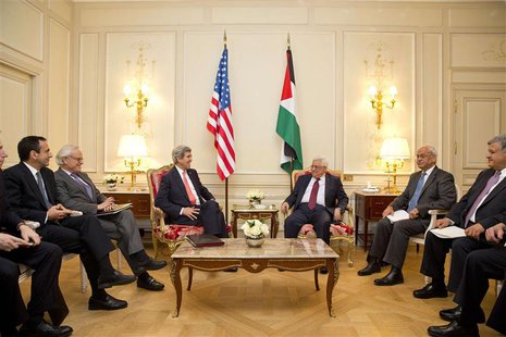 U.S. Secretary of State John Kerry (L) sits with Palestinian President Mahmoud Abbas during their talks in Paris February 19, 2014. REUTERS/ U.S. Secretary of State John Kerry (L) sits with Palestinian President Mahmoud Abbas during their talks in Paris February 19, 2014. REUTERS/