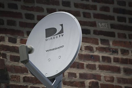 A Direct TV dish is seen outside a home in the Queens borough of New York July 29, 2013. REUTERS/Shannon Stapleton A Direct TV dish is seen outside a home in the Queens borough of New York July 29, 2013. REUTERS/Shannon Stapleton