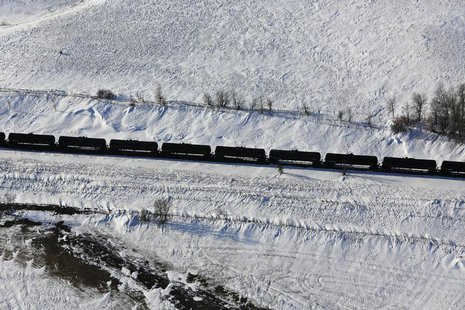 A train makes its way along the Burlington Northern Santa Fe (BNSF) rail line outside of Williston, North Dakota March 12, 2013. REUTERS/Sha A train makes its way along the Burlington Northern Santa Fe (BNSF) rail line outside of Williston, North Dakota March 12, 2013. REUTERS/Sha