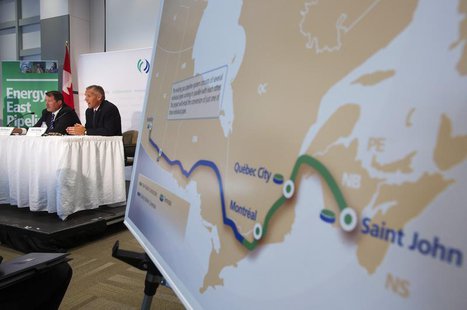 TransCanada President and CEO Russ Girling (2nd L) announces the new Energy East Pipeline during a news conference in Calgary, Alberta, Augu TransCanada President and CEO Russ Girling (2nd L) announces the new Energy East Pipeline during a news conference in Calgary, Alberta, Augu