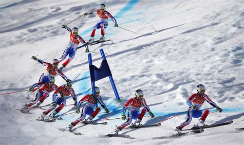 France's Alexis Pinturault clears a gate during the second run of the men's alpine skiing giant slalom event at the 2014 Sochi Winter Olympi France's Alexis Pinturault clears a gate during the second run of the men's alpine skiing giant slalom event at the 2014 Sochi Winter Olympi