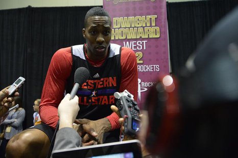 Feb 15, 2014; New Orleans, LA, USA; 2014 Western Conference All-Stars center Dwight Howard (Rockets) (12) talks to the media after the pract Feb 15, 2014; New Orleans, LA, USA; 2014 Western Conference All-Stars center Dwight Howard (Rockets) (12) talks to the media after the pract