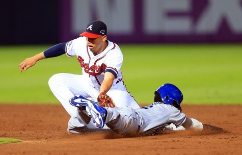 Oct 4, 2013; Atlanta, GA, USA; Atlanta Braves shortstop Andrelton Simmons (19) tags out Los Angeles Dodgers shortstop Dee Gordon (9) on a st Oct 4, 2013; Atlanta, GA, USA; Atlanta Braves shortstop Andrelton Simmons (19) tags out Los Angeles Dodgers shortstop Dee Gordon (9) on a st