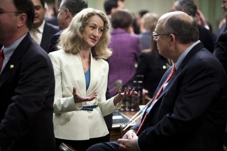 California Secretary of State Debra Bowen (L) speaks with members of the Legislature before Governor Jerry Brown delivers the State of the S California Secretary of State Debra Bowen (L) speaks with members of the Legislature before Governor Jerry Brown delivers the State of the S