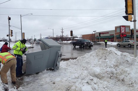 Appleton public works crews work to repair traffic lights damaged in a crash at the intersection of Meade St. and Northland Ave., Feb. 20, 2014. (Photo from: Appleton DPW) Appleton public works crews work to repair traffic lights damaged in a crash at the intersection of Meade St. and Northland Ave., Feb. 20, 2014. (Photo from: Appleton DPW)