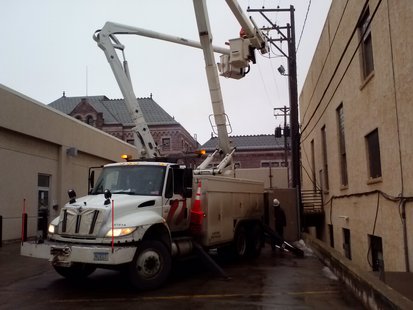 Xcel crews work on an electrical fire that ignited a power pole. (Photo KELO AM) Xcel crews work on an electrical fire that ignited a power pole. (Photo KELO AM)
