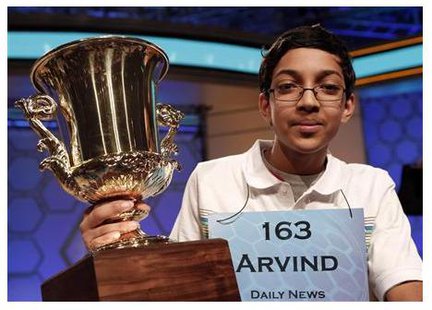 Arvind Mahankali of New York holds his trophy after winning the National Spelling Bee at National Harbor in Maryland May 30, 2013.
CREDIT: REUTERS/KEVIN LAMARQUE Arvind Mahankali of New York holds his trophy after winning the National Spelling Bee at National Harbor in Maryland May 30, 2013.
CREDIT: REUTERS/KEVIN LAMARQUE