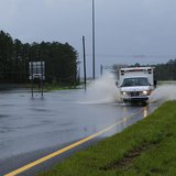 A flooded road. A flooded road.