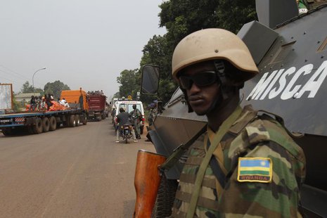 African peace keeping soldiers escort a humanitarian convoy in Bangui, February 15, 2014. REUTERS/Luc Gnago African peace keeping soldiers escort a humanitarian convoy in Bangui, February 15, 2014. REUTERS/Luc Gnago