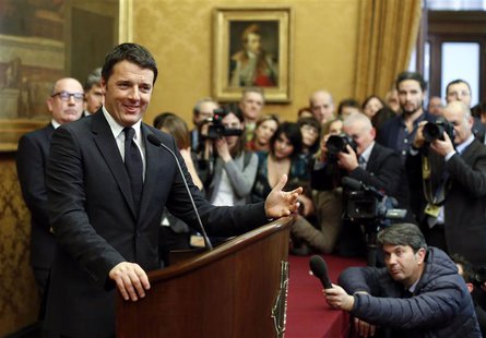 Italian Prime Minister-designate Matteo Renzi talks to reporters at the end of consultations with leaders of Italian parties at the Parliame Italian Prime Minister-designate Matteo Renzi talks to reporters at the end of consultations with leaders of Italian parties at the Parliame