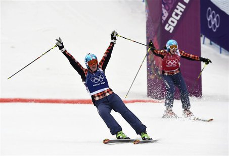 Second-placed Kelsey Serwa (R) and winner Marielle Thompson, both of Canada, react during the women's freestyle skiing skicross finals at th Second-placed Kelsey Serwa (R) and winner Marielle Thompson, both of Canada, react during the women's freestyle skiing skicross finals at th