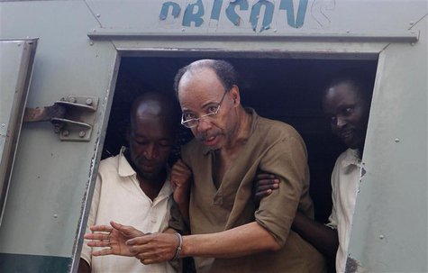 Former U.S. congressman Mel Reynolds (C) arrives at the Harare Magistrates court, February 20, 2014. REUTERS/Philimon Bulawayo Former U.S. congressman Mel Reynolds (C) arrives at the Harare Magistrates court, February 20, 2014. REUTERS/Philimon Bulawayo