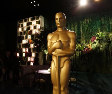 A large Oscar statue is seen in the Dolby Ballroom during the 86th Oscars Governors Ball press preview in Hollywood, California February 20, A large Oscar statue is seen in the Dolby Ballroom during the 86th Oscars Governors Ball press preview in Hollywood, California February 20,