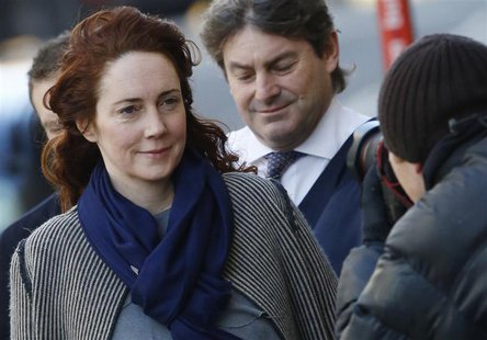 Former News International chief executive Rebekah Brooks and her husband Charlie Brooks are photographed by media as they arrive at the Old Former News International chief executive Rebekah Brooks and her husband Charlie Brooks are photographed by media as they arrive at the Old