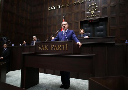 Turkey's Prime Minister Tayyip Erdogan addresses members of parliament from his ruling AK Party (AKP) during a meeting at the Turkish parlia Turkey's Prime Minister Tayyip Erdogan addresses members of parliament from his ruling AK Party (AKP) during a meeting at the Turkish parlia