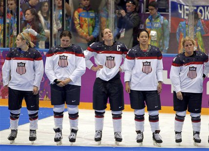 Team USA's Monique Lamoureux, Megan Bozek, Meghan Duggan, Julie Chu and Brianna Decker (L-R) stand dejected after losing their women's gold Team USA's Monique Lamoureux, Megan Bozek, Meghan Duggan, Julie Chu and Brianna Decker (L-R) stand dejected after losing their women's gold