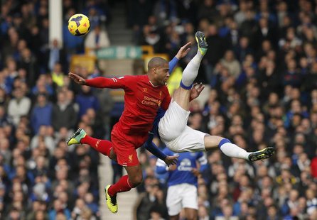 Liverpool's Glen Johnson (L) challenges Everton's Ross Barkley during their English Premier League soccer match at Goodison Park in Liverpoo Liverpool's Glen Johnson (L) challenges Everton's Ross Barkley during their English Premier League soccer match at Goodison Park in Liverpoo