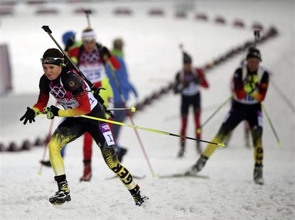 Germany's Evi Sachenbacher-Stehle (front) competes during the women's biathlon 10km pursuit event at the 2014 Sochi Winter Olympics, in this Germany's Evi Sachenbacher-Stehle (front) competes during the women's biathlon 10km pursuit event at the 2014 Sochi Winter Olympics, in this