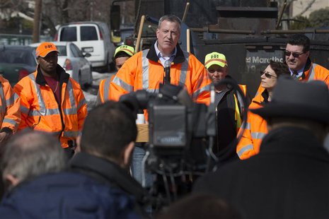New York Mayor Bill de Blasio speaks to the press during a news conference in the Maspeth section of Queens, New York February 20, 2014. REU New York Mayor Bill de Blasio speaks to the press during a news conference in the Maspeth section of Queens, New York February 20, 2014. REU
