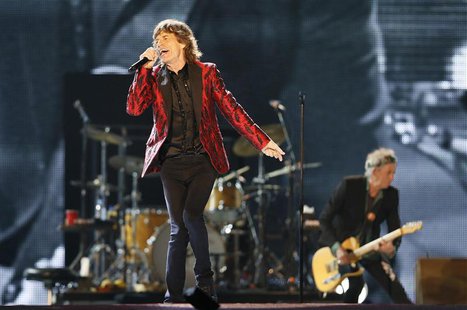 Mick Jagger of the Rolling Stones performs during a concert in Abu Dhabi February 21, 2014. REUTERS/ Stringer Mick Jagger of the Rolling Stones performs during a concert in Abu Dhabi February 21, 2014. REUTERS/ Stringer
