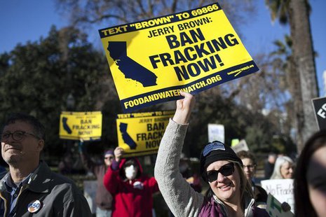 Kimberly Ramsey (R) protests fracking outside the State Capitol after Governor Jerry Brown delivered his State of the State address at the C Kimberly Ramsey (R) protests fracking outside the State Capitol after Governor Jerry Brown delivered his State of the State address at the C
