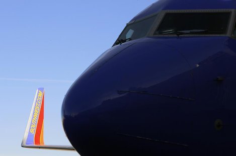 A Southwest Airlines jet waits on the tarmac at Denver International Airport in Denver January 22, 2014. REUTERS/Rick Wilking A Southwest Airlines jet waits on the tarmac at Denver International Airport in Denver January 22, 2014. REUTERS/Rick Wilking