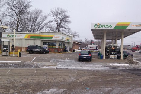 Neenah police investigate an armed robbery at a gas station on S. Commercial St., Feb. 21, 2014. (Photo from FOX 11). Neenah police investigate an armed robbery at a gas station on S. Commercial St., Feb. 21, 2014. (Photo from FOX 11).