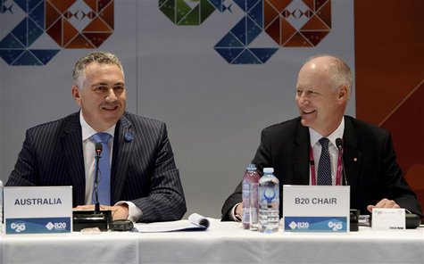 Australian Treasurer Joe Hockey (L) and CEO of Wesfarmers Richard Goyder attend the Joint G20 and B20 Infrastructure Roundtable as part of t Australian Treasurer Joe Hockey (L) and CEO of Wesfarmers Richard Goyder attend the Joint G20 and B20 Infrastructure Roundtable as part of t