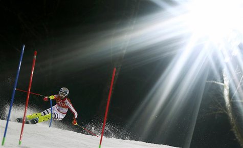 Germany's Maria Hoefl-Riesch clears a gate during the second run of the women's alpine skiing slalom event at the 2014 Sochi Winter Olympics Germany's Maria Hoefl-Riesch clears a gate during the second run of the women's alpine skiing slalom event at the 2014 Sochi Winter Olympics
