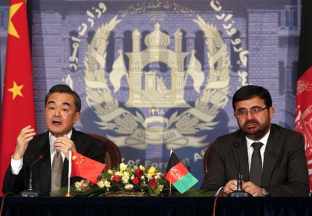 Chinese Foreign Minister Wang Yi (L) speaks as Afghanistan's Foreign Minister Zarar Ahmad Osmani looks on during a news conference in Kabul Chinese Foreign Minister Wang Yi (L) speaks as Afghanistan's Foreign Minister Zarar Ahmad Osmani looks on during a news conference in Kabul