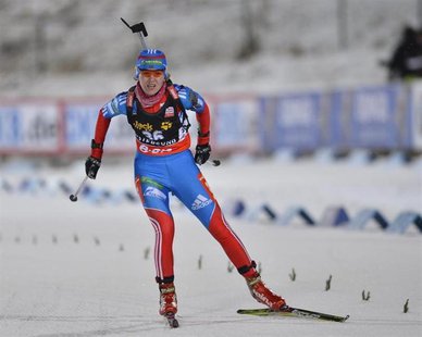 Ekaterina Glazyrina of Russia crosses the finish line during the women's 15 km individual event at the Biathlon World Cup in Ostersund Novem Ekaterina Glazyrina of Russia crosses the finish line during the women's 15 km individual event at the Biathlon World Cup in Ostersund Novem