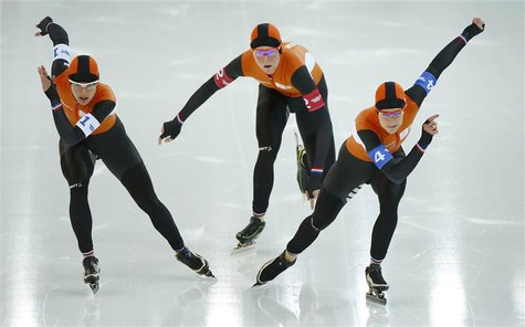 (L-R) Marrit Leenstra, Jorien Ter Mors and Irene Wust of the Netherlands compete in the women's speed skating team pursuit semi-finals durin (L-R) Marrit Leenstra, Jorien Ter Mors and Irene Wust of the Netherlands compete in the women's speed skating team pursuit semi-finals durin