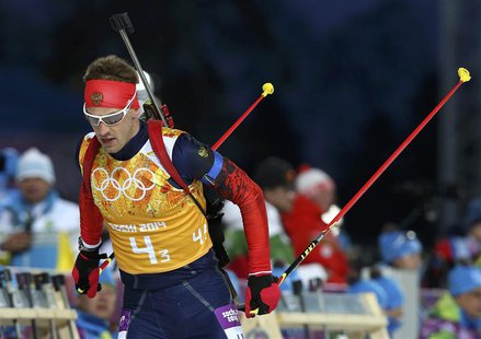 Russia's Dmitry Malyshko skis during the men's biathlon 4 x 7.5 km relay at the Sochi 2014 Winter Olympic Games in Rosa Khutor February 22, Russia's Dmitry Malyshko skis during the men's biathlon 4 x 7.5 km relay at the Sochi 2014 Winter Olympic Games in Rosa Khutor February 22,