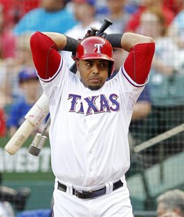 Texas Rangers' Nelson Cruz warms up in the on deck circle before batting Arizona Diamondbacks in the fourth inning of their MLB interleague Texas Rangers' Nelson Cruz warms up in the on deck circle before batting Arizona Diamondbacks in the fourth inning of their MLB interleague