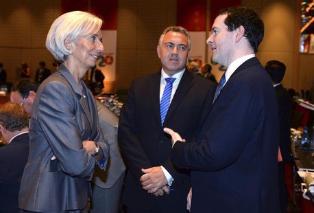 International Monetary Fund Managing Director Christine Lagarde (L) chats with Britain's Chancellor of the Exchequer George Osbourne (R) and International Monetary Fund Managing Director Christine Lagarde (L) chats with Britain's Chancellor of the Exchequer George Osbourne (R) and