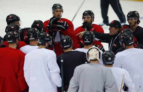 Canada's men's ice hockey team head coach Mike Babcock speaks to his team during a practice at the 2014 Sochi Winter Olympics, February 22, Canada's men's ice hockey team head coach Mike Babcock speaks to his team during a practice at the 2014 Sochi Winter Olympics, February 22,
