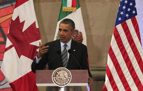 U.S. President Barack Obama gives a speech during a news conference next to Canada's Prime Minister Stephen Harper and Mexico's President En U.S. President Barack Obama gives a speech during a news conference next to Canada's Prime Minister Stephen Harper and Mexico's President En