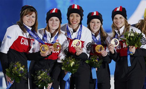 Gold medallists Canada's Jennifer Jones, Kaitlyn Lawes, Jill Officer, Dawn McEwen and Kirsten Wall (R-L) pose during the victory ceremony fo Gold medallists Canada's Jennifer Jones, Kaitlyn Lawes, Jill Officer, Dawn McEwen and Kirsten Wall (R-L) pose during the victory ceremony fo
