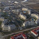An aerial view from a helicopter shows hotels and residential houses recently constructed for the 2014 Winter Olympics in the Adler district An aerial view from a helicopter shows hotels and residential houses recently constructed for the 2014 Winter Olympics in the Adler district