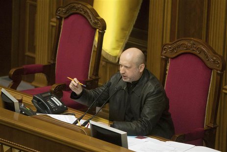 Newly elected speaker of parliament Oleksander Turchynov attends a session of the Ukrainian parliament in Kiev February 22, 2014. REUTERS/Al Newly elected speaker of parliament Oleksander Turchynov attends a session of the Ukrainian parliament in Kiev February 22, 2014. REUTERS/Al