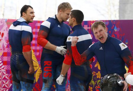 Russia's pilot Alexander Zubkov (R) reacts during the four-man bobsleigh event of the Sochi 2014 Winter Olympic Games at the Sanki Sliding C Russia's pilot Alexander Zubkov (R) reacts during the four-man bobsleigh event of the Sochi 2014 Winter Olympic Games at the Sanki Sliding C