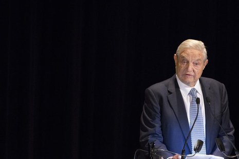George Soros speaks on stage at the Annual Freedom Award Benefit Event hosted by the International Rescue Committee at the Waldorf-Astoria i George Soros speaks on stage at the Annual Freedom Award Benefit Event hosted by the International Rescue Committee at the Waldorf-Astoria i