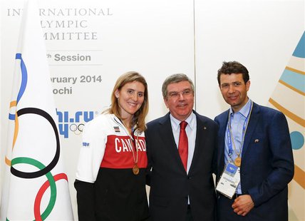 International Olympic Committee (IOC) President Thomas Bach (C) pose with newly elected members of the IOC, Canada's Hayley Wickenheiser (L) International Olympic Committee (IOC) President Thomas Bach (C) pose with newly elected members of the IOC, Canada's Hayley Wickenheiser (L)