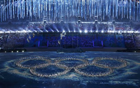 Performers form the Olympic rings during a show at the closing ceremony for the 2014 Sochi Winter Olympics, February 23, 2014. REUTERS/Eric Performers form the Olympic rings during a show at the closing ceremony for the 2014 Sochi Winter Olympics, February 23, 2014. REUTERS/Eric