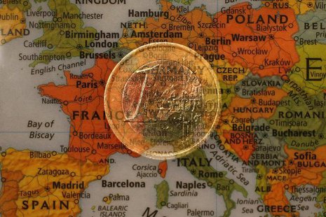 A picture illustration taken with the multiple exposure function of the camera shows a one Euro coin and a map of Europe, January 9, 2013. R A picture illustration taken with the multiple exposure function of the camera shows a one Euro coin and a map of Europe, January 9, 2013. R