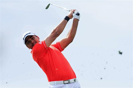 Feb 23, 2014; Marana, AZ, USA; Jason Day with his approach shot on the 14th during the semifinal round of the World Golf Championships - Acc Feb 23, 2014; Marana, AZ, USA; Jason Day with his approach shot on the 14th during the semifinal round of the World Golf Championships - Acc