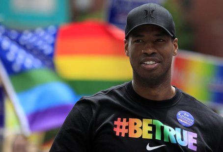NBA player Jason Collins marches in the Gay Pride Parade in Boston, Massachusetts June 8, 2013. REUTERS/Jessica Rinaldi NBA player Jason Collins marches in the Gay Pride Parade in Boston, Massachusetts June 8, 2013. REUTERS/Jessica Rinaldi